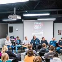 Panelists speak to a group at a Career Bootcamp